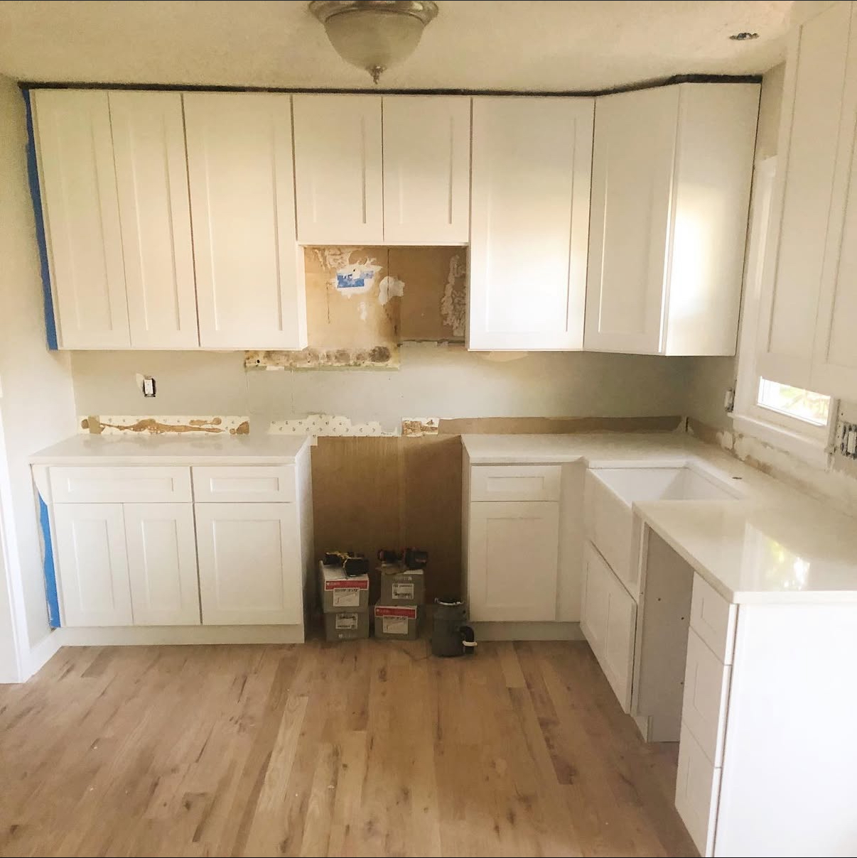 Kitchen renovation in progress - cabinet installation